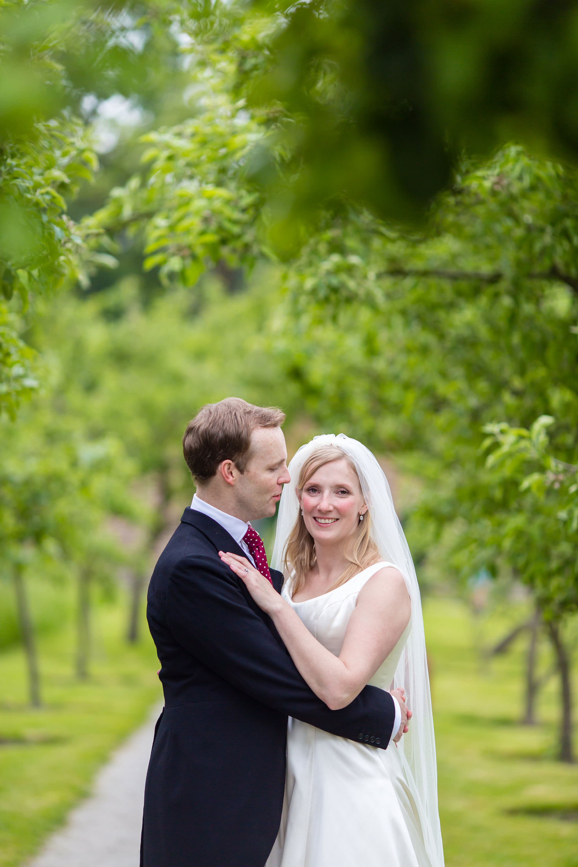 pictures of the bride and groom in the walled garden