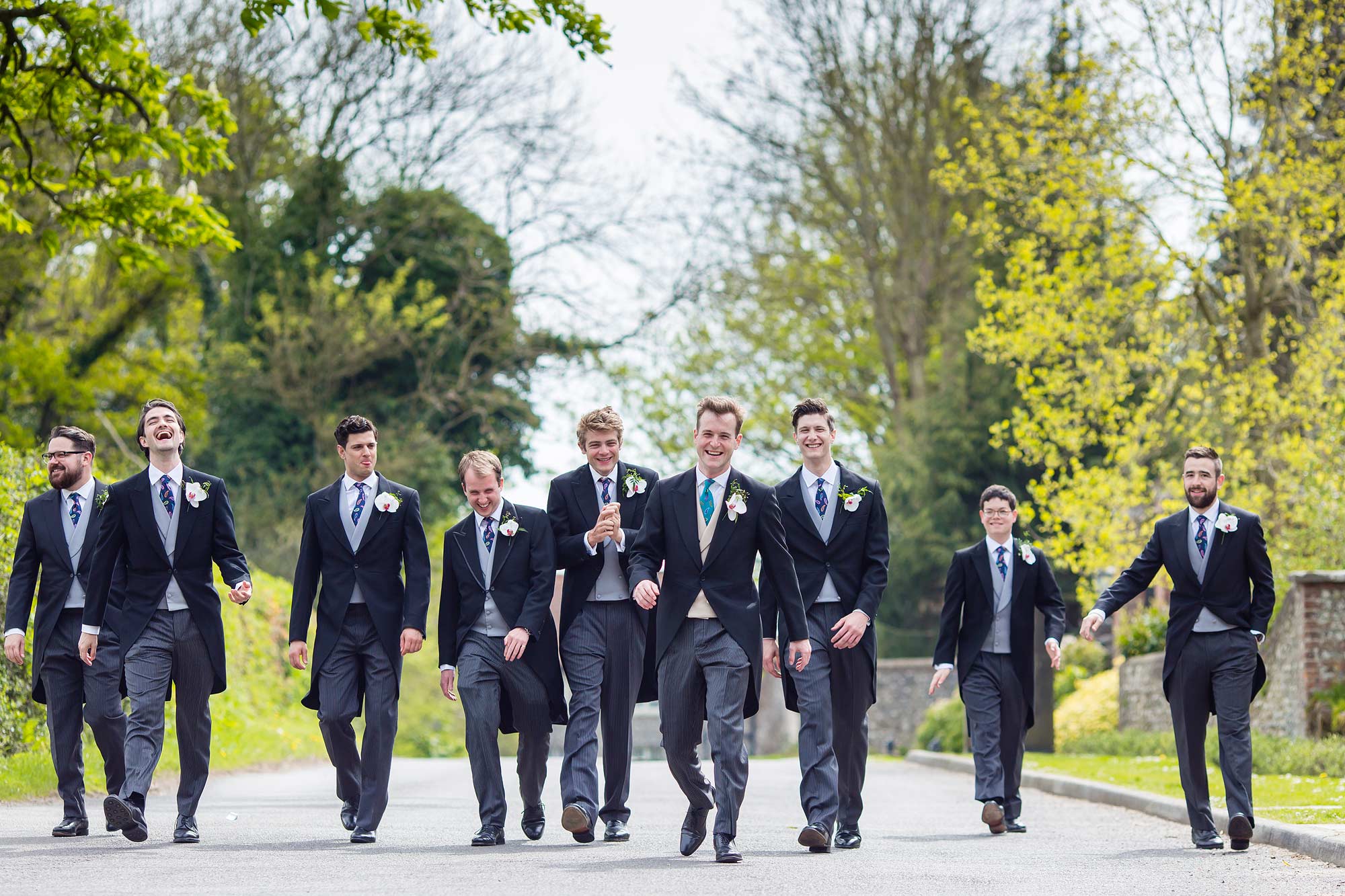 The guys take a walk before the Goodwood House Wedding