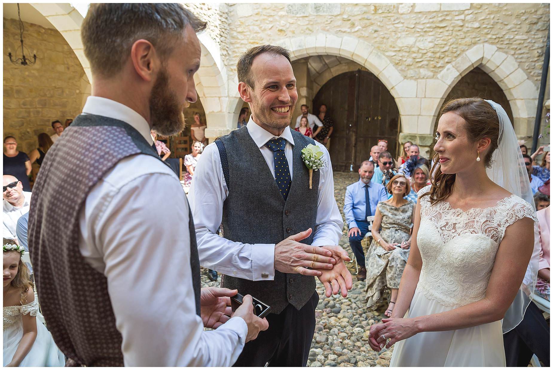 exchange of rings at chateau brametourte wedding