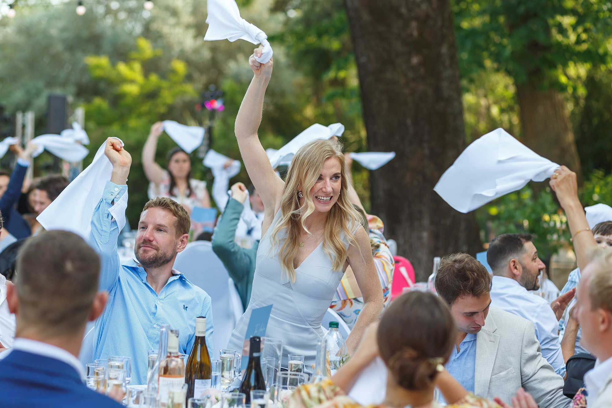 South of France wedding celebration, napkin waving