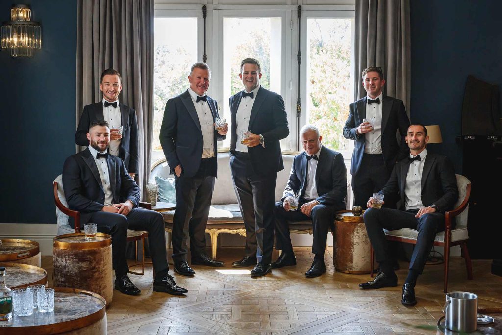 Irish wedding in France guys with whiskey