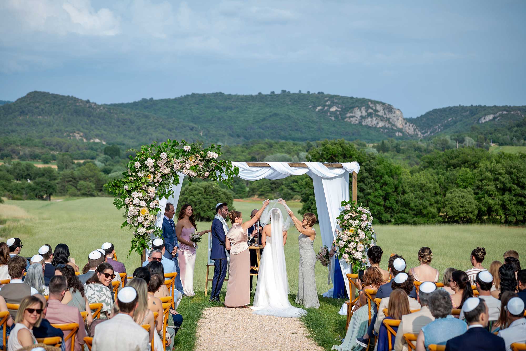 Jewish wedding ceremony at Domaine de Noé with panoramic view.