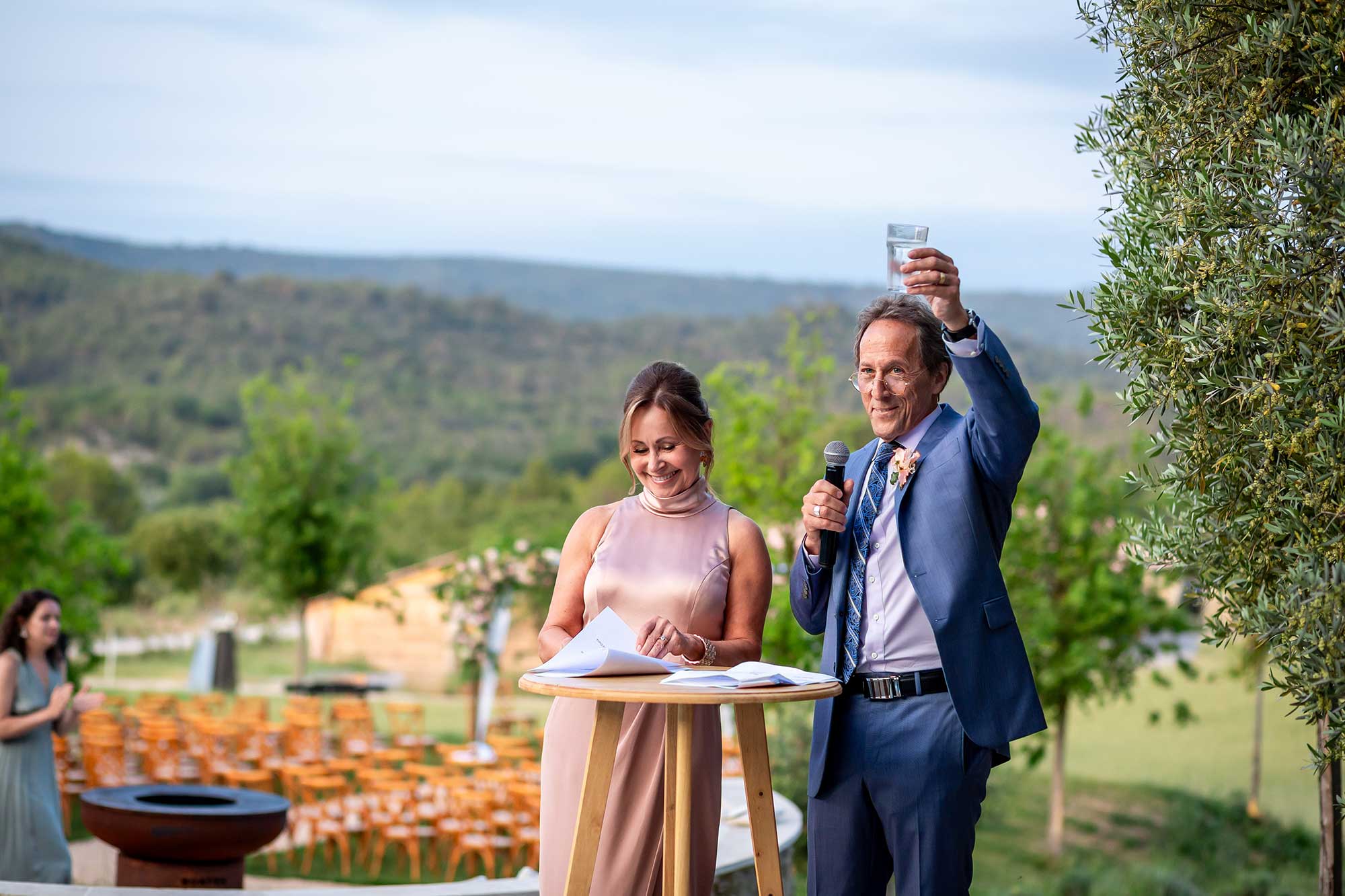 Emotional outdoor wedding speech at Domaine de Noé