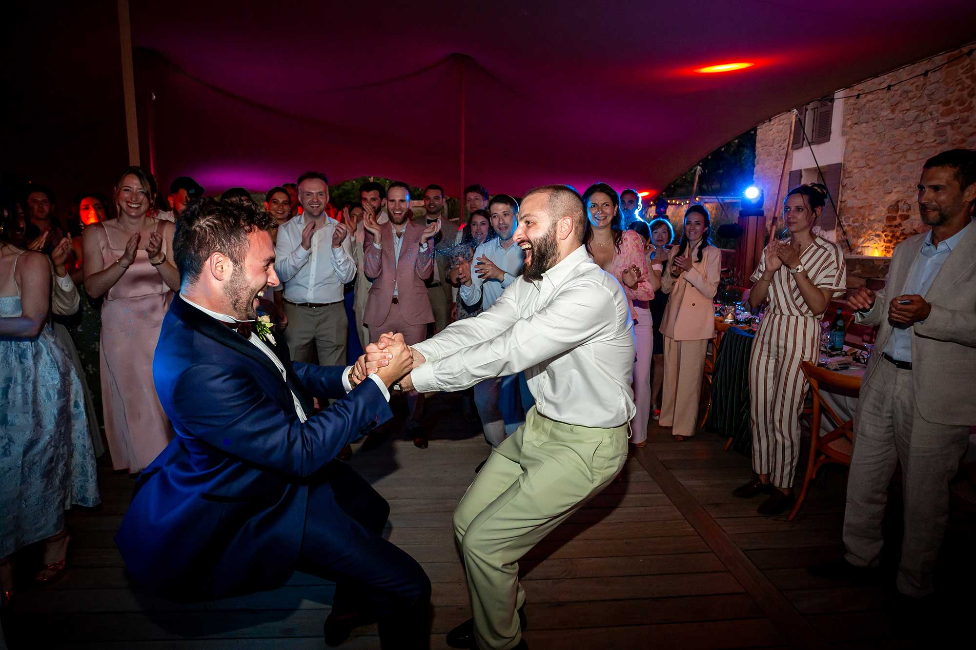 Hora dancing at Jewish wedding at Domaine de Noé
