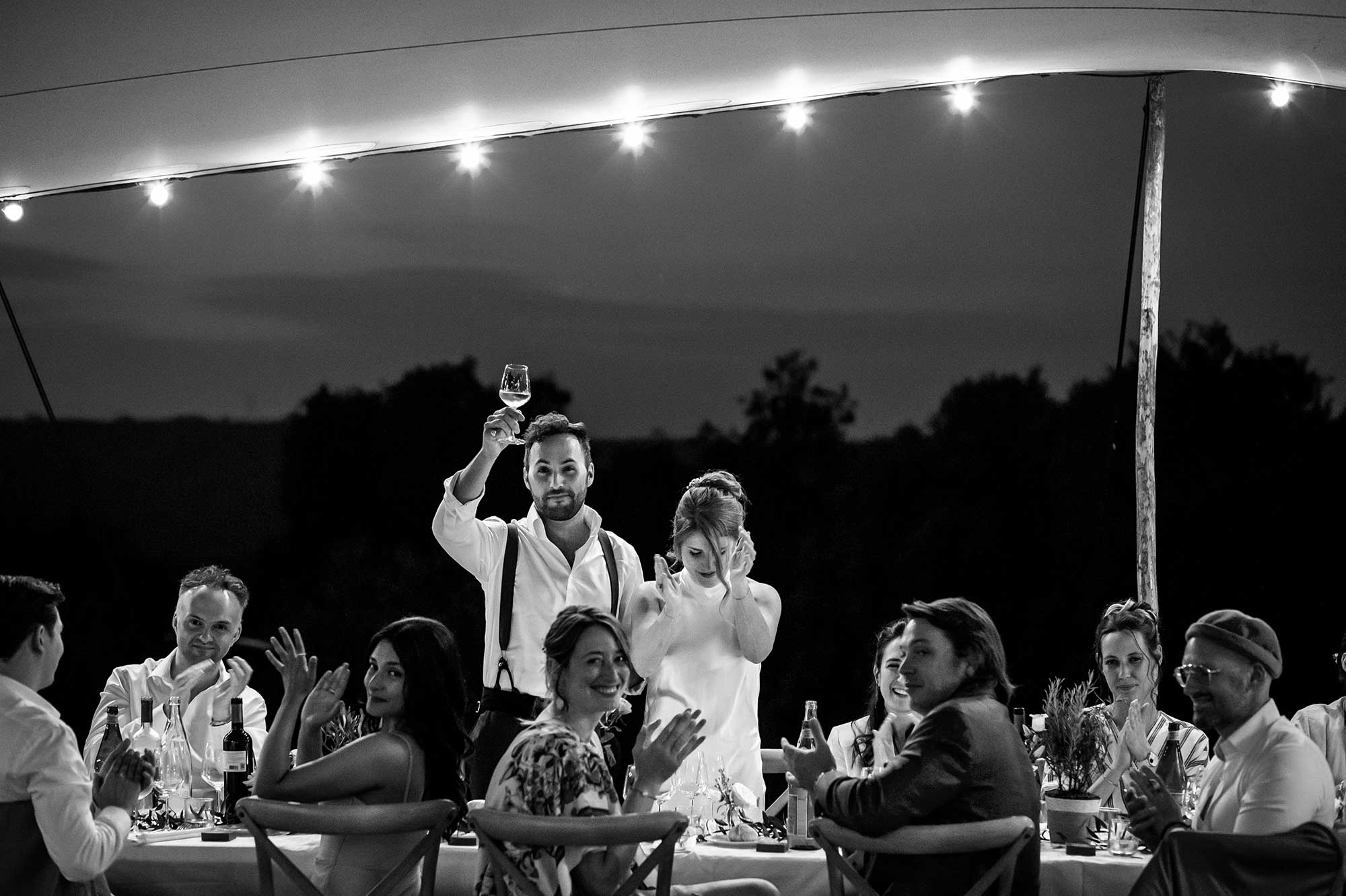Wedding guest speech in reception tent at Domaine de Noé