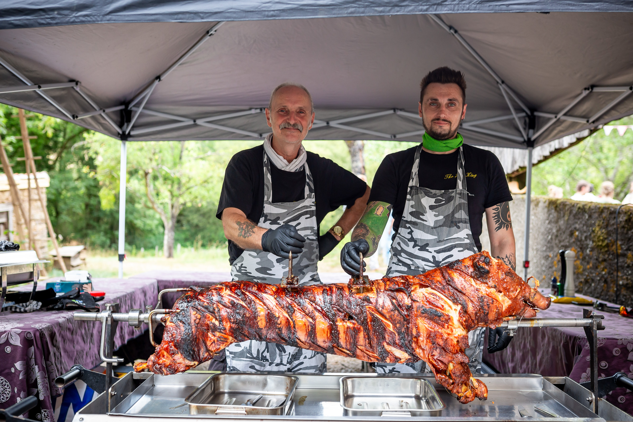 Hog King caterers with a whole hog at the wedding reception