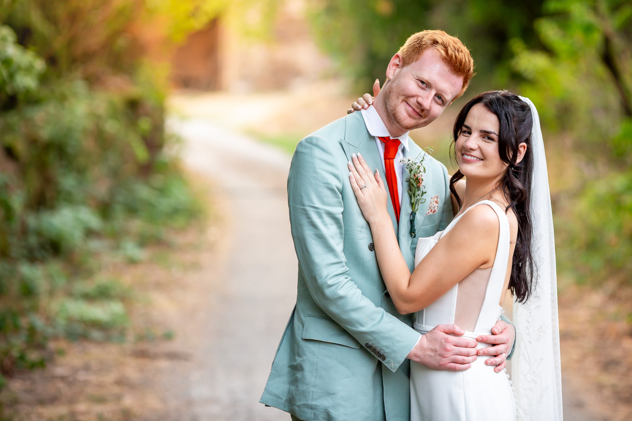 Kayley and Alexander during golden-hour portraits at their French countryside wedding