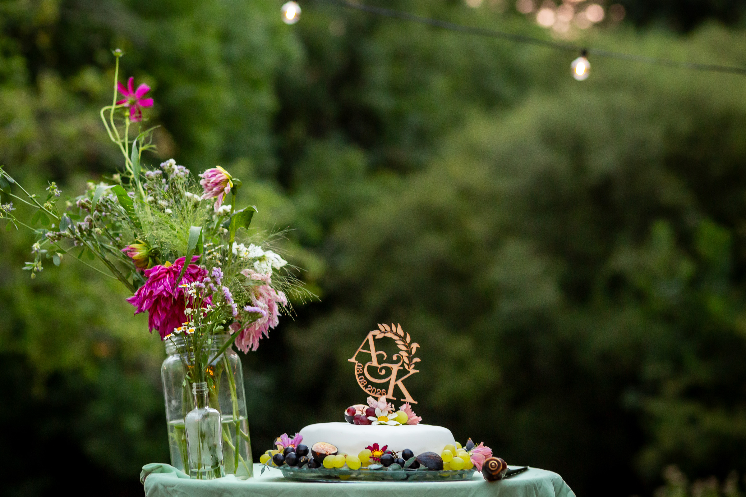 Wedding cake made by Alexander’s mother with flowers and fruit