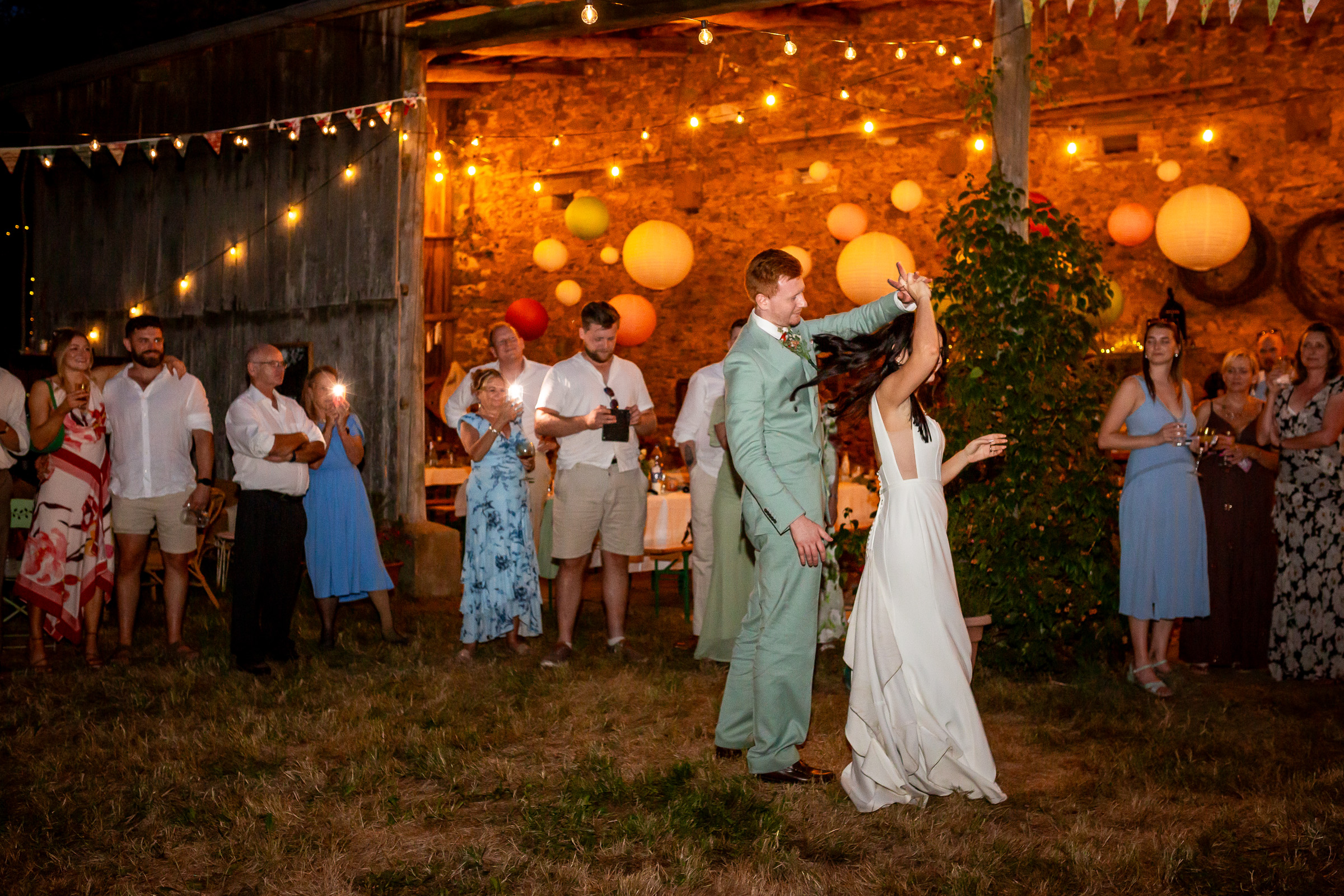 Kayley and Alexander’s first dance outside the illuminated barn