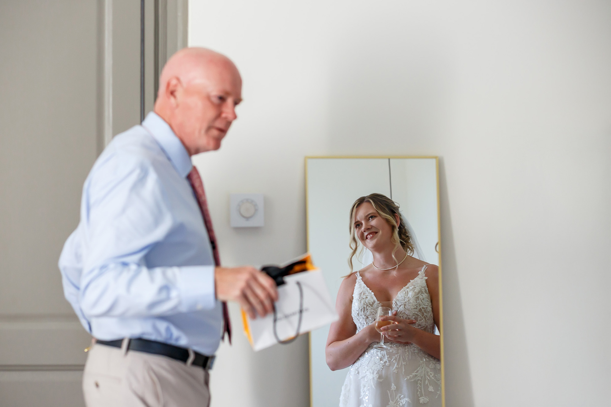 Hannah’s father giving her a bracelet before the ceremony