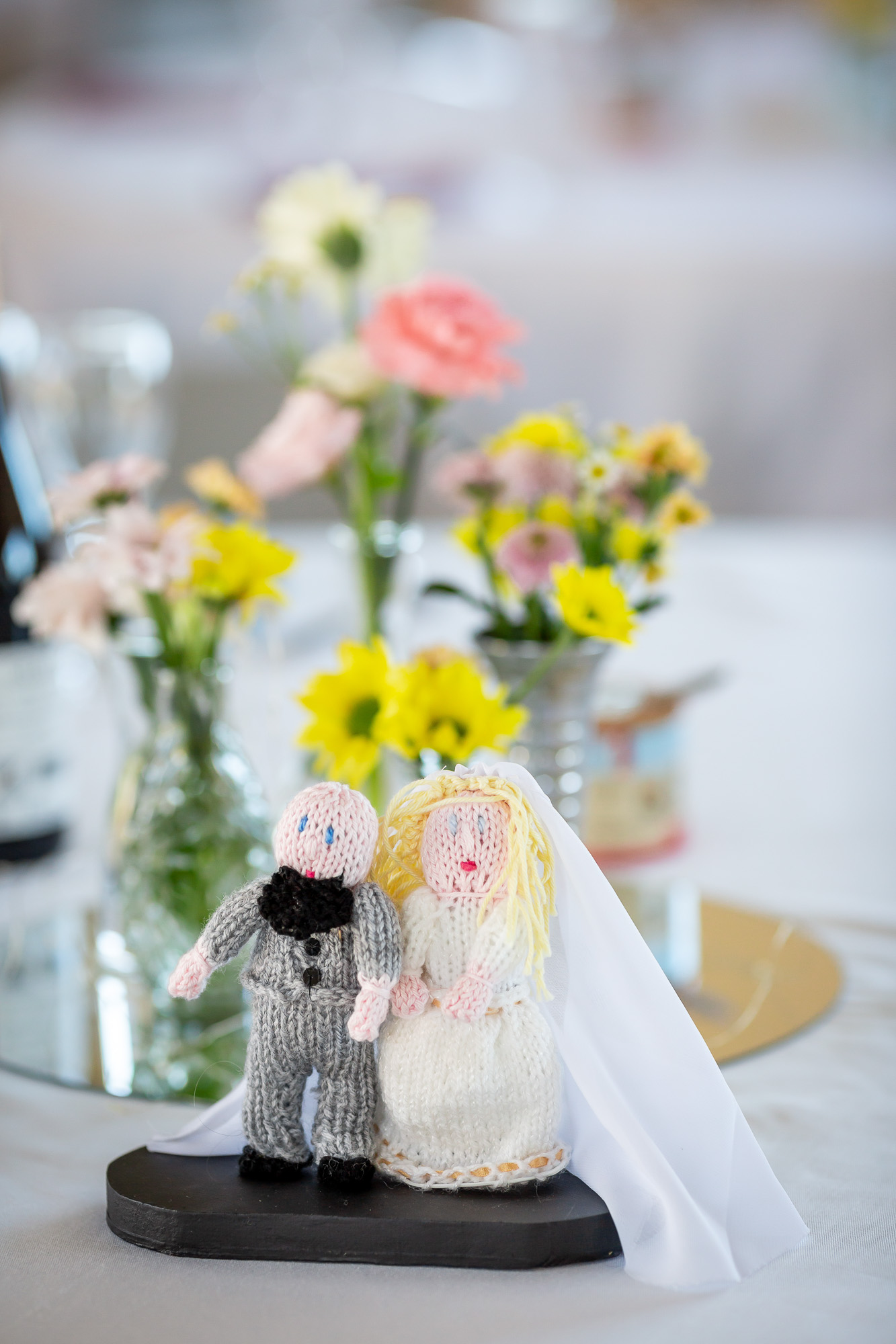 Crocheted dolls made to look like Hannah and Thomas
