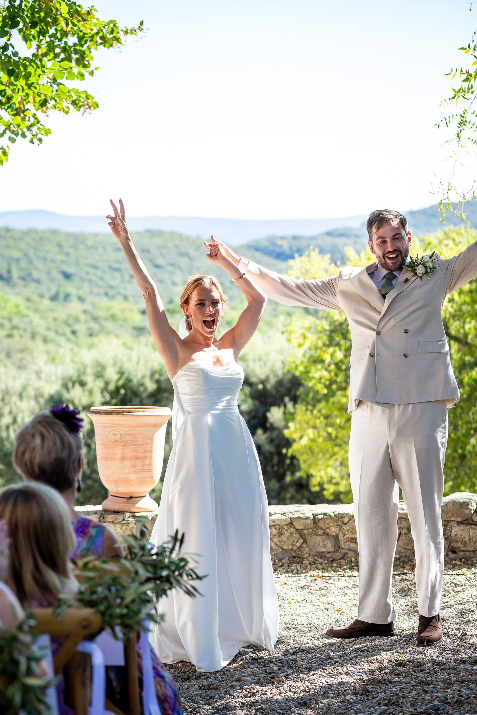 Emma and Rowan celebrating during their wedding ceremony