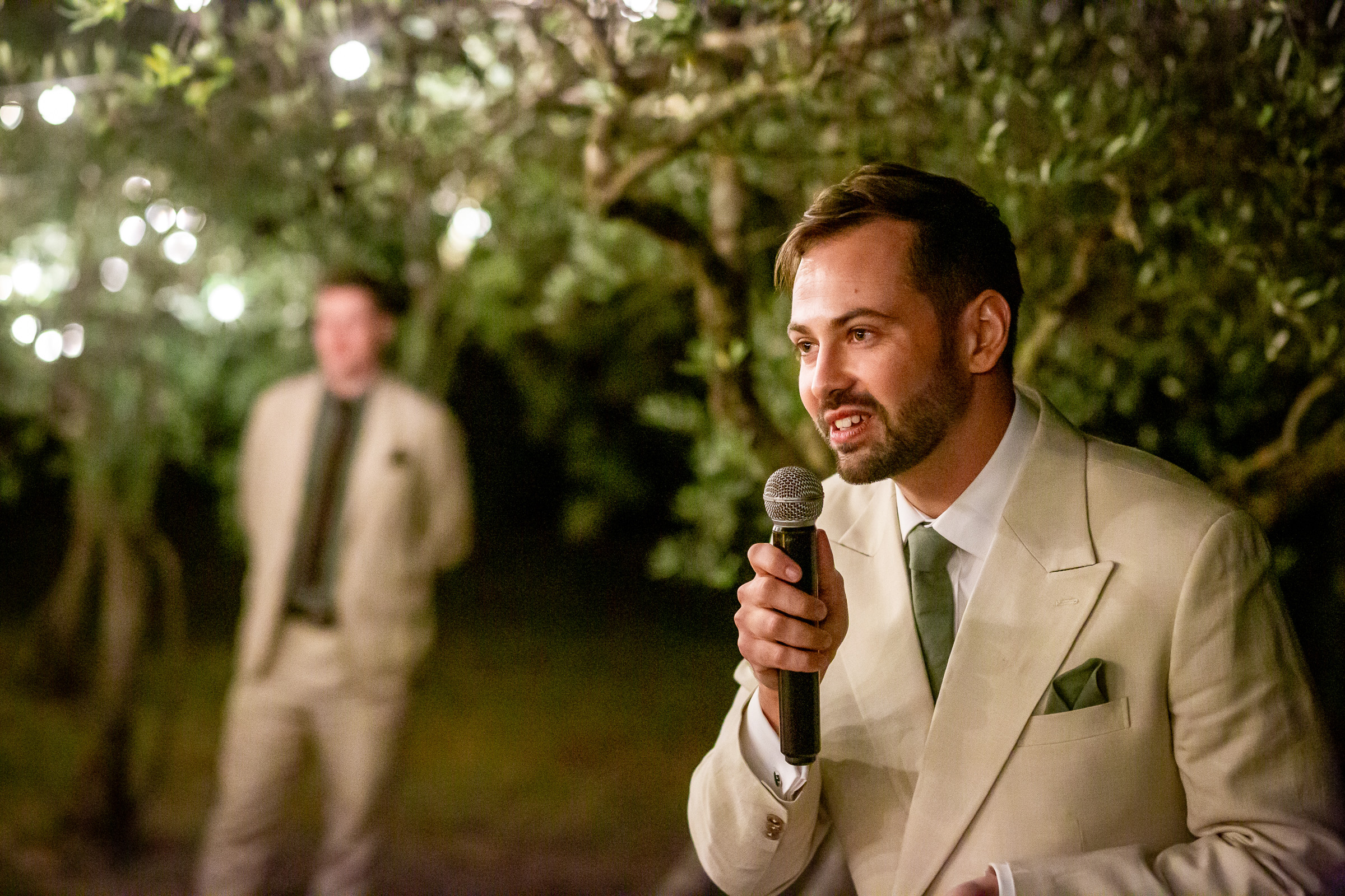 Rowan giving his wedding speech in the olive grove