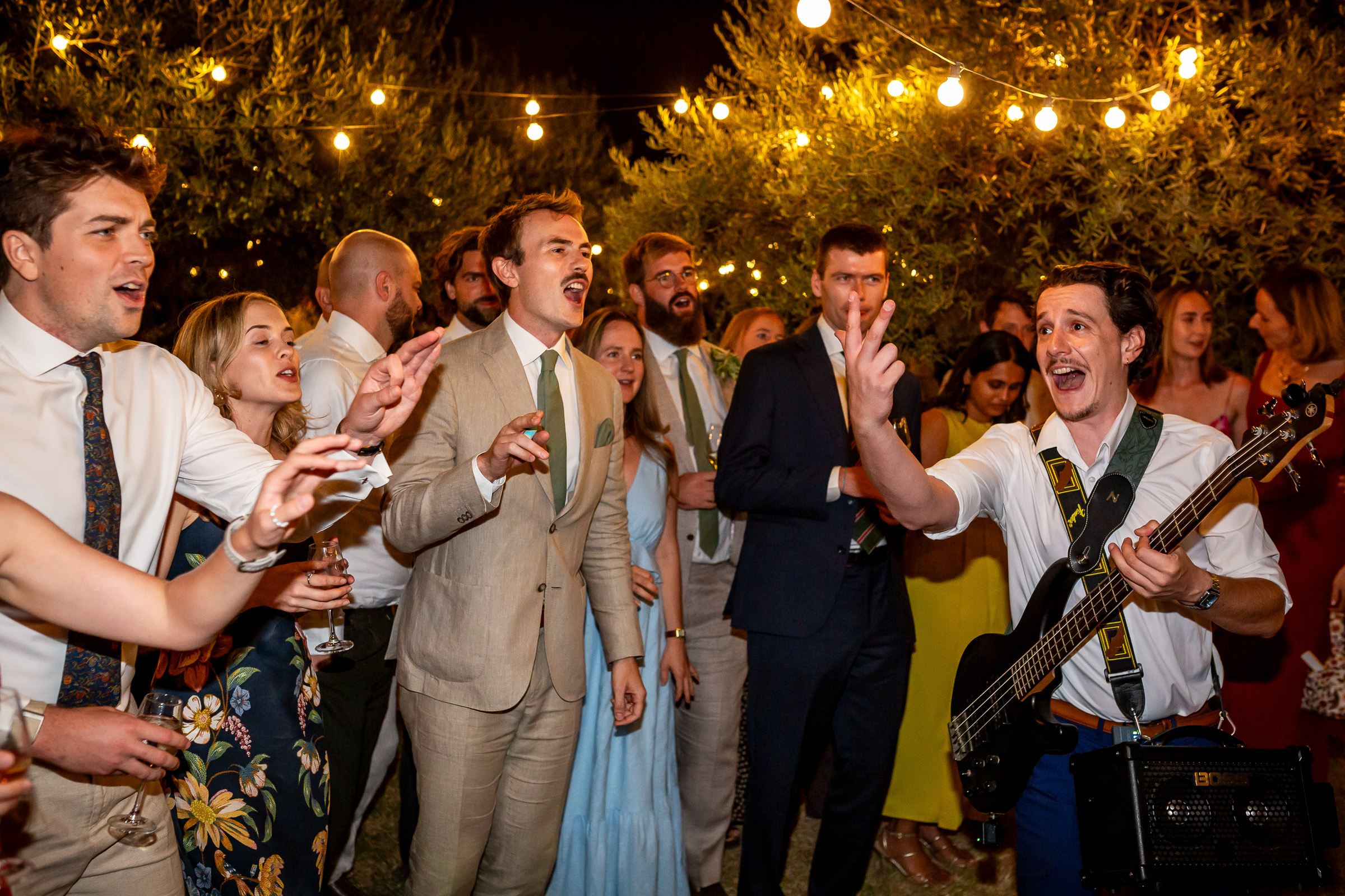 The strolling band playing amongst guests during dinner at Le Domaine du Rey